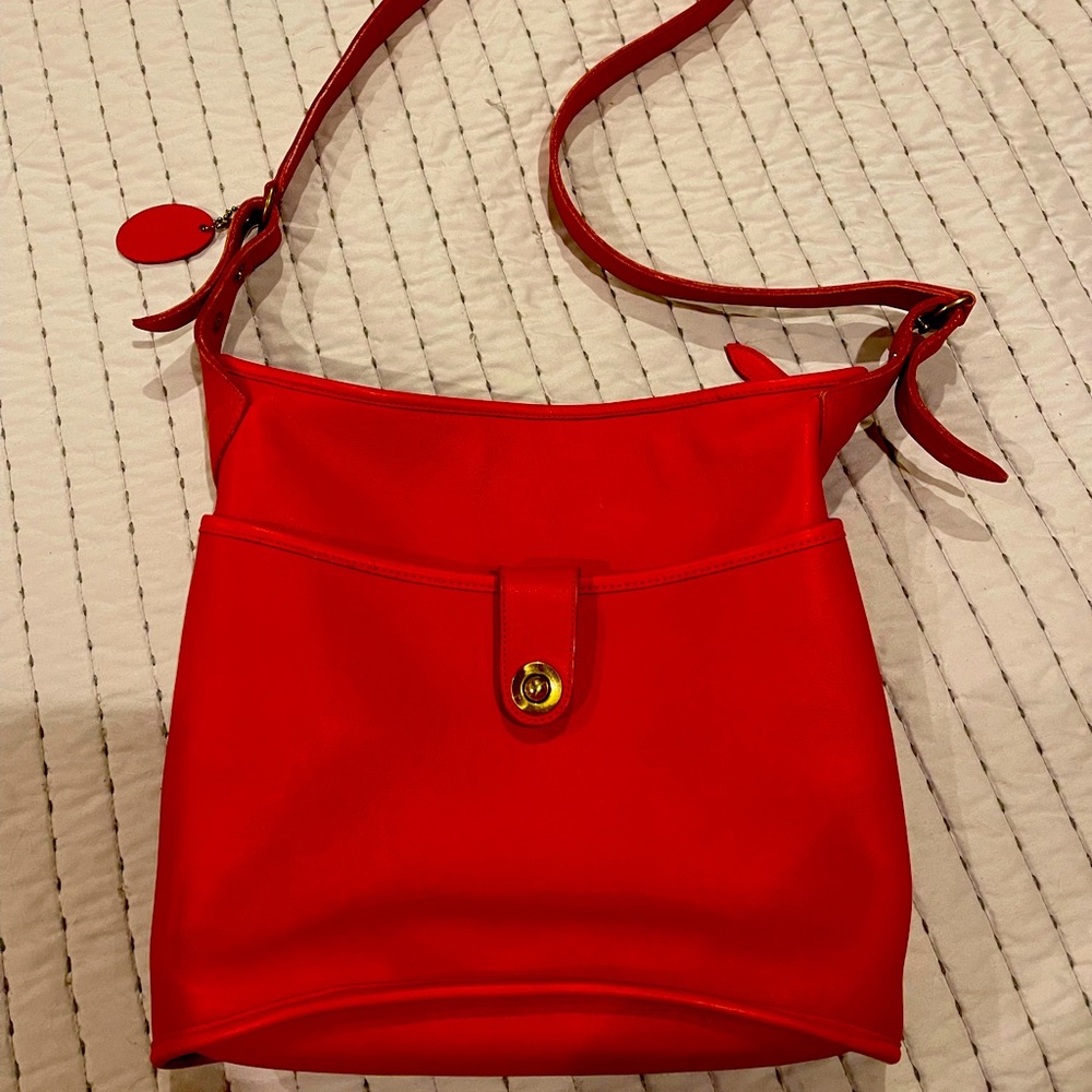 Irina Maxim purse with long shoulder strap